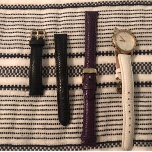 Gold-Tone Watch with Interchangeable Black, Purple, and White Leather Straps